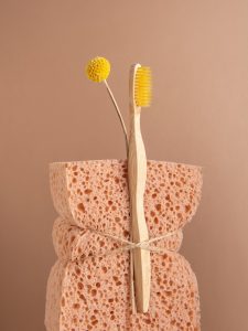 a yellow flower in a bag